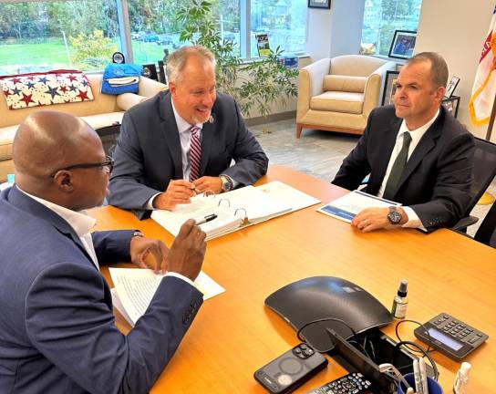 DA David Hoovler with Chief Investigator Rudolph Simmons and Investigator Darrin Fulton.