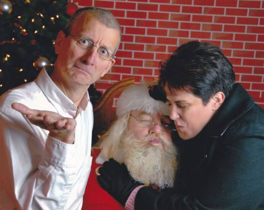 Congrats to our holiday winners! Submitted by Dan Karpf of Andover, N.J. Second Place - "I caught my wife kissing Santa. It was fun posing with this Santa Claus."