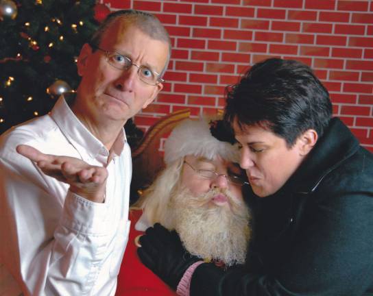Vote for the best holiday photo Submitted by Dan Karpf of Andover, N.J. " I Caught My Wife Kissing Santa. It was fun posing with this Santa Claus!"