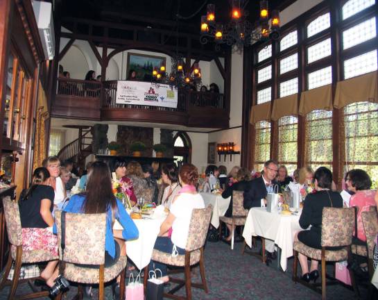 Fashion show raises $8,000 for Warwick in Bloom Photo by Roger Gavan The event included a luncheon with the Warwick Valley High School Chamber Strings entertaining guests with a musical interlude.