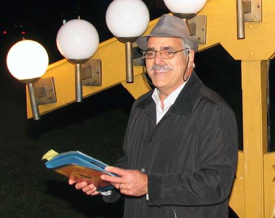The man who lights the first candle File photo by Roger Gavan Moshe Schwartzberg officiates at the 2012 Menorah lighting.
