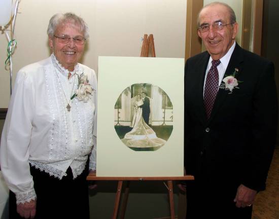 Leo and Gladys Kaytes celebrate 60th anniversary Gladys and Leo Kaytes pose by their wedding photograph taken 60 years ago.