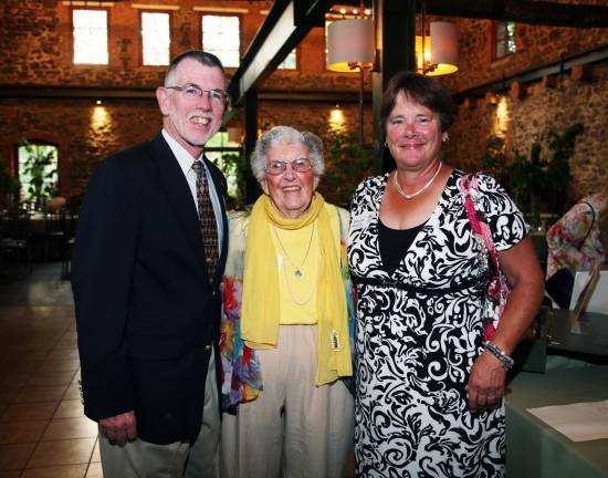 Benefit raises $75,000 for Orange County Land Trust Photo by Diane Pell Photography More than $75,000 was raised for land preservation and farmland protection at the Orange County Land Trustís 2012 Annual Benefit Reception and Silent Auction held on June 8 at the Brotherhood Winery in Washingtonville. Pictured from left to right are: Town of Warwick Supervisor Michael Sweeton, Mary Goodman and Deborah Sweeton.