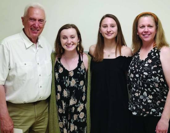 Pine Island Chamber awards three 2018 Black Dirt Scholarships Photos by Peter Lyons Hall Caption: Black Dirt Scholarship Fund winners Claire Bulkley and Emma Davis share a moment with Black Dirt Scholarship Fund Committee Co-chairs Peter Groenendaal and Sondra Hall.