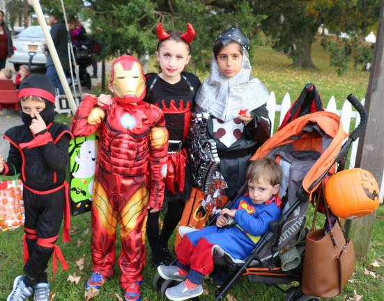 Annual Lions Club and Village of Warwick Halloween Parade draws 1,200 witches, goblins and other assorted characters There were ghosts, goblins, witches and an assortment of movie, cartoon and even more creative characters. From left, Logan Attard,4, Jonathan Camilleri,5, Hailey Camilleri,8, Lucas Attard, 8, and his brother Liam, 2.