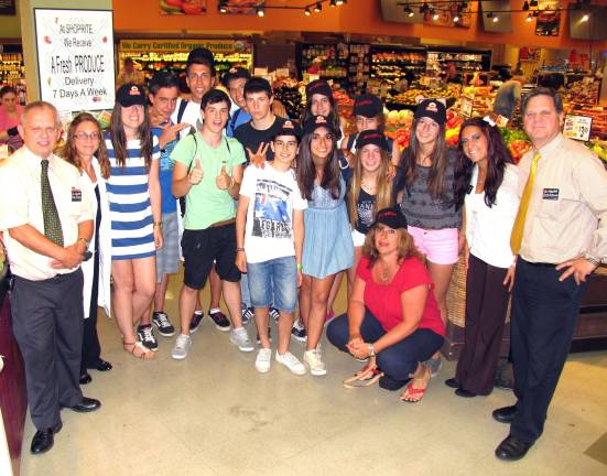 Spanish exchange students visit ShopRite during cultural exchange program Photo by Roger Gavan On Tuesday, July 9, 12 of the 16 Spanish exchange students visiting Warwick as part of a cultural exchange program, arrived at Warwick ShopRite, where they purchased items for the Warwick Valley Ecumenical Councilís Food Pantry. Adults from left, Warwick ShopRite Assistant Store Manager Dan Grusz, Store Dietician Jessica Altland, Tiffany Megna, ShopRite Experience Coordinator Lauren Struble and Assistant Store Manager Charlie Gafkowski.