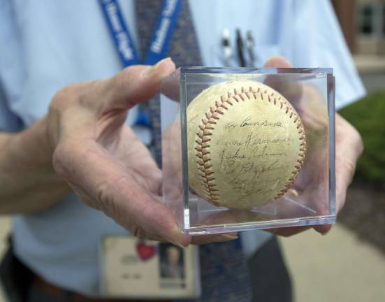 School to display donated memento of 1955 World Series A baseball signed by the 1955 Brooklyn Dodgers, including players Jackie Robinson and Pee Wee Reese. Warwick Valley High School Substitute teacher Yale Ekus recently donated the ball to the Athletic Department.