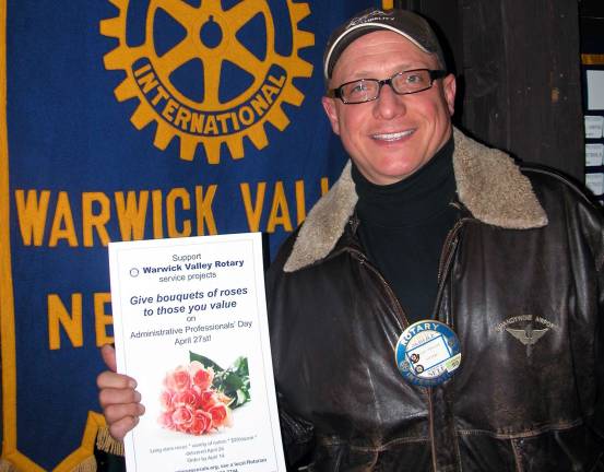 Rotarians sell roses for service projects Rotarians sell roses for service projects