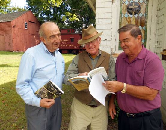 Richard Hull selected as Warwick Citizen of the Year Photo by Sean Ryan Dr. Richard Hull, center, has been selected Warwickís 2013-2014 Citizen of the Year. He will be honored during an Oct. 23 ceremony at the Landmark Inn. Co-chairs for the event are Warwick Rotarians Leo Kaytes, left, and Stan Martin, shown looking at two of Hullís books, ìHistory of Warwick, New Yorkî and ìPeople of the Valley Revisited, History of Warwick, New York, 1700-2005.î They are standing outside the Warwick Historical Societyís 107-year-old United African Methodist Church, which is undergoing renovations on Forester Avenue.