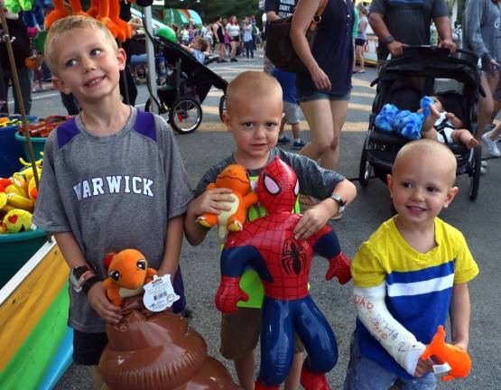 Let summer begin We're having a great time and we all won prizes: Cooper McGill, 6, and his brothers Ethan, 4, and Nolan, 2.