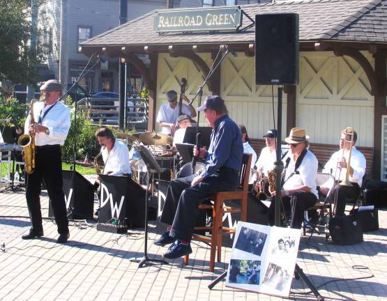 Dick Wells and the Jim Perry Band draws huge crowd at Railroad Green free concert All of the band arrangements were that of retired Sgt. Major Jim Perry (left), former group leader and lead alto saxophonist with the United States Military Academy Band Jazz Knights at West Point.