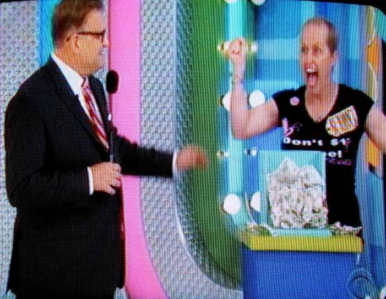 Come on down Photos by Roger Gavan Show host Drew Carey asked her to pick the box containing the grand prize money.Bethany Negersmith selected number seven, considered a lucky number, and it was. It contained $10,000 in cash.