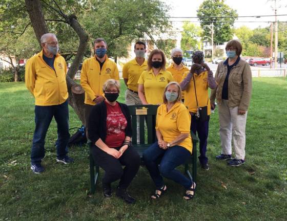 On Monday, Sept. 14, the Warwick Lions Club donated the newest bench to the Town of Warwick Historical Society. Standing from left are: George McManus, Cory Bachman, Ryan O’ Leary, Christine Adams, Kathy McManus, Hakima Al-Zahra and Historical Society President Mary Ann Knight. Seated from left, Warwick Historical Society Executive Director Nora Gurvich and Carol Buchanan. Provided photo.