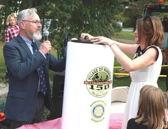 New time capsule now set in place to be opened in 2067 Mayor Michael Newhard and Sesquicentennial Events Coordinator Mary Collura sealed the new Time Capsule.