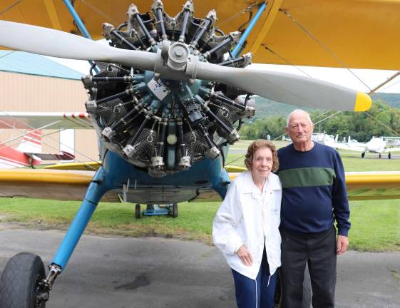 Ninety Nines return to Warwick Municipal Airport for annual picnic and meeting Special guest speaker Kathleen Hilbrand, 93, who served in World War II as a member of the Women Airforce Service Pilots (WASP) poses with Airport Manager Dave Mac Millan in front of a PT 17, a WW II US Army primary pilot trainer, which was one of the planes she flew.