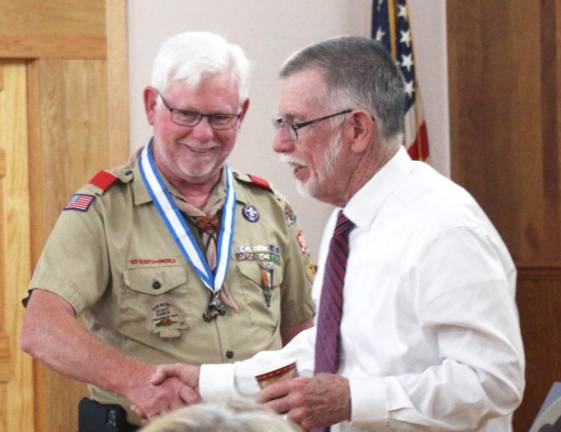 Former troop leader Dan Burns anf Warwick Town Supervisor, Michael Sweeton during the Eagle Scout ceremony at the Polish Legion of American Veteran’s Hall in Pine Island.