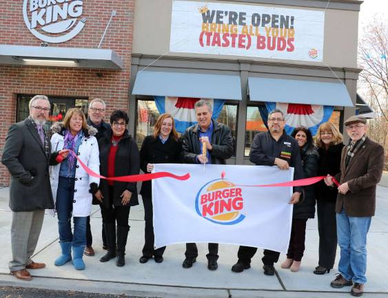 Burger King Warwick celebrates grand re-opening Photo by Roger Gavan On Dec. 13, Warwick Supervisor Michael Sweeton (far right), Mayor Michael Newhard (far left) and members of the Chamber of Commerce joined franchise co-owner Drew Paterno (center), Corporation Business Manager Sarah Beaudoin (center left) and gestaurant General Manager Rene Cevallos (center right) to celebrate the grand re-opening of Burger King Warwick with a ribbon-cutting ceremony.