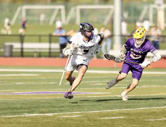 Wildcats defeat Crusaders #7, Max weeks brings the ball upfield in the first quarter