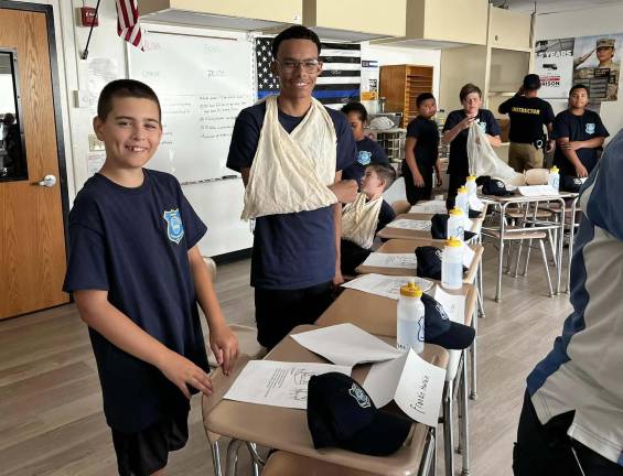 Join the Junior Police Academy this summer Participants at the Junior Police Academy learn about First Aid.
