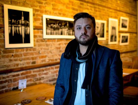 Art exhibit crosses bridges linking NYC photographer to his Warwick home Greg Rhein's latest New York City photo exposé will be honored with an opening artist's reception on Wednesday, Jan. 10, from 5:30 to 8:30 p.m. at The Grange, 1 Ryerson Road in Warwick.