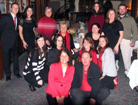 Vogel & Moore Insurance Agency receives Nationwide President's Award Photo by Roger Gavan Ann Marie Moore and her team at Vogel & Moore Insurance: Front from left, Moore and her husband, Pete; second row from left: Scherrie Kennedy, Desiree Pappas, Chris Atkinson and Marie Moore; third row from left: Founder Ann M Vogel, Tara Petzold, Debbie Boulanger and her husband, Matthew; and rear from left: Sean Gavan, Toniann Pappas, Barb Knapp and Catherine McClelland.