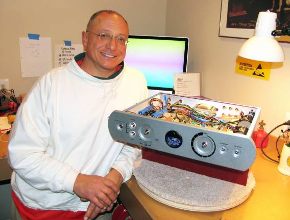 High fidelity amplifiers in Warwick Photo by Roger Gavan Roger Gibboni, founder of Rogers High Fidelity.