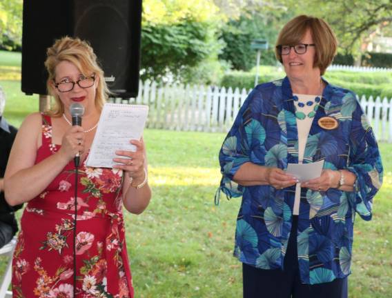 During the evening, Mary Ann Knight, president of the Historical Society (right), and Executive Director Nora Gurich (left) welcomed guests.