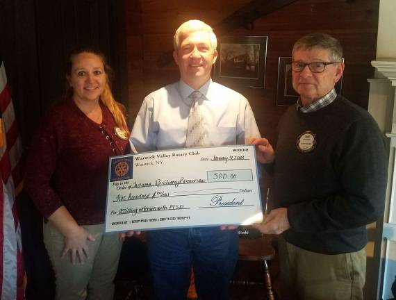 Rotarians donate to Veterans’ ‘Warrior Camp’ Rotarians donate to Veterans’ ‘Warrior Camp’