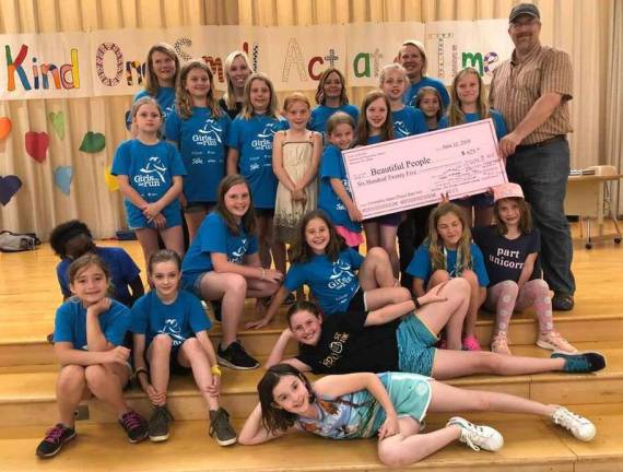 Warwick Girls on the Run Team raises $625 for Beautiful People Photo provided by Lisa-Ann Weisbrod Pictured from left to right, beginning in the top row, are: Denise Kunisch, Cathy Bloomer, Amanda Rabolli, Lisa Weisbrod and Peter Ladka; middle row: Emma Rudnick, Carly Kunisch, Rylee Mendrzycki, Mia Trinceri, Nina Rametta, Nora Finnegan, Kasandra Lashuay, Lorelei Rabolli and Cameron Knox; and in front: Abigiya Bekele-Arcuri, Jamison McVeigh, Mia Battifarano, Brigid Bubenik, Zoe Moller Adalynne Forchette, Cavan Byrne, Madelyn McSweeney and Chloe Austin.