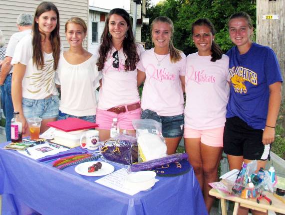 Ladies Night Out draws large crowds to downtown Warwick Members of the Warwick Valley High School girls varsity softball team were raising funds to help pay fortravel to a spring tournement and training camp in Florida.