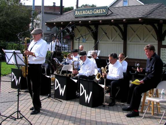 September song Photos by Roger Gavan All of the band arrangements were that of retired Sgt. Major Jim Perry, former group leader and lead alto saxophonist with the United States Military Academy Band Jazz Knights at West Point.