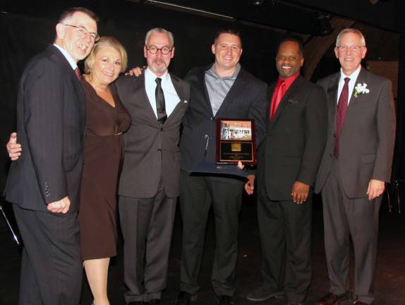 Warwick chamber celebrates is members Additional photos can be found online at warwickadvertiser.com Co-owner Thomas Torres accepted the ìBest Building Renovationî award for CaffÈ a la Mode. From left, Town of Warwick Supervisor Michael Sweeton, Greenwood Lake Mayor Barbara Moore, Warwick Mayor Michael Newhard, Thomas Torres, Cedrick Glasper, president of the Warwick Valley Chamber of Commerce, and Executive Director Michael Johndrow.