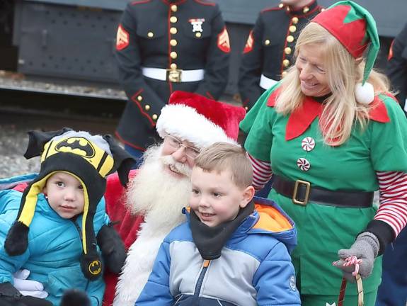 Santa was also on board with the elves and a Marine Corps detachment. They spent almost an hour posing for photographs with children and families.