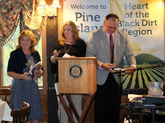 Pine Island Chamber honors John Redman as its Citizen of the Year Ketherine Brieger, Distinguished Service Award recipient, with Pine Island Chamber Secretry Jeanette Shanahan and President Leonard DeBuck.