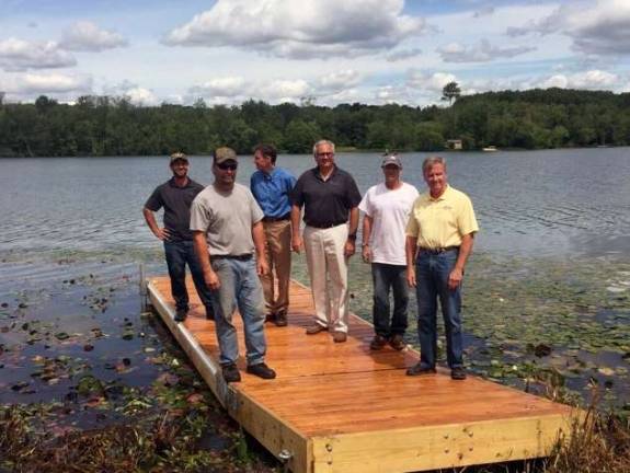 This is the floating dock &#xfe;&#xc4;&#xee; donated by local company Meeco Sullivan &#xfe;&#xc4;&#xee; for canoe and kayak launches. Pictured from left to right, the Meeco Sullivan team is: Adam Schlomann, Mike Keppler, Bob Sullivan, Jim Mason, Mike Hennelly and Steve Sullivan.
