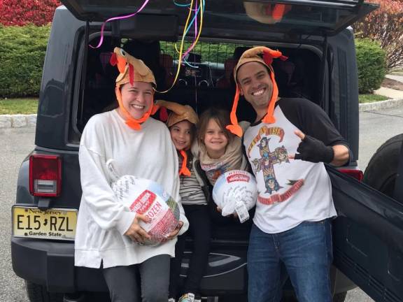 The Greco family and Sparta Challenger Baseball League donated 30 turkeys for the holiday. Photo courtesy of Valerie Macchio.