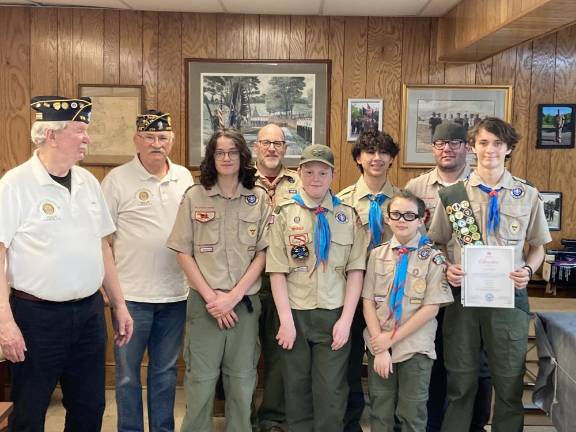 L-R: Legion Post 214 Commander Tom Brennan; Past American Legion County Commander Frank Gilner; boy scout Harry Anderson; scout Chair Scott Brown; scouts Jack Castellano, Holden Frommeyer, and T.J. Brown; scout leader Tim Brown; and senior patrol leader Aiden Anderson.