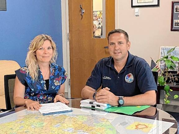 Local resident takes on county media relations job Rebecca Sheehan with County Executive Steve Neuhaus.