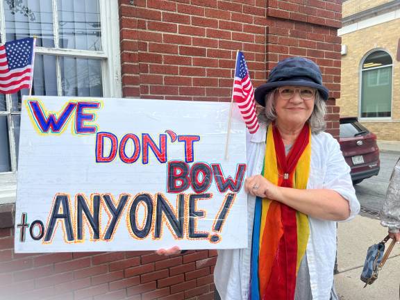 Hundreds rally in ‘No Kings Day’ protest Joan Tirrell of Warwick during the June 14, 2025 “No Kings Day” rally on Main Street.
