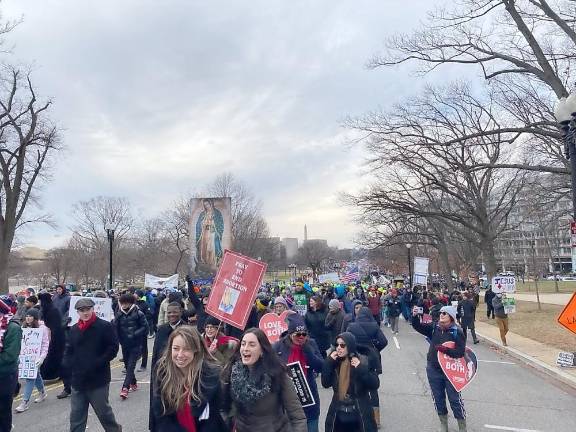 Alex Lynch, a native of Warwick and graduate of Warwick Valley High School, class of 2007, marched in front, second from right.