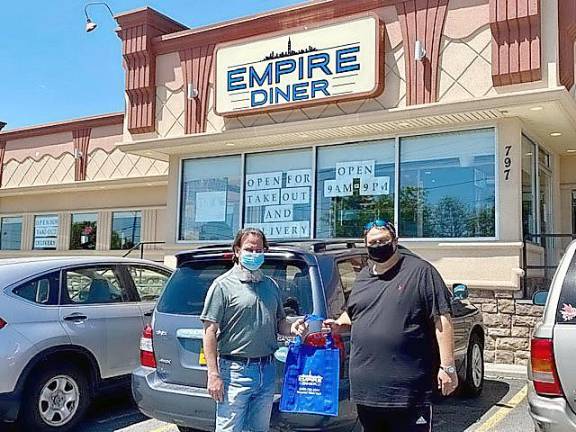 Rabbi Roger Lerner of Monroe Temple of Liberal Judaism and Empire Diner owner David Wenger joined forces in September to replicate a Pennsylvania program that has been successful in feeding hundreds of children per week over the past decade. The Empire Diner in Monroe creates and produces the meals, which are packaged and delivered to families each week by a dedicated team of volunteers. (Photo source: dinners4kidsoc.org)