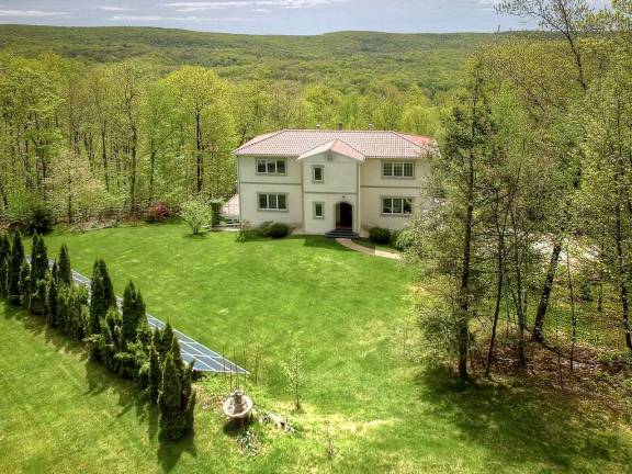 Beautiful home with lush outdoor landscape Beautiful home with lush outdoor landscape