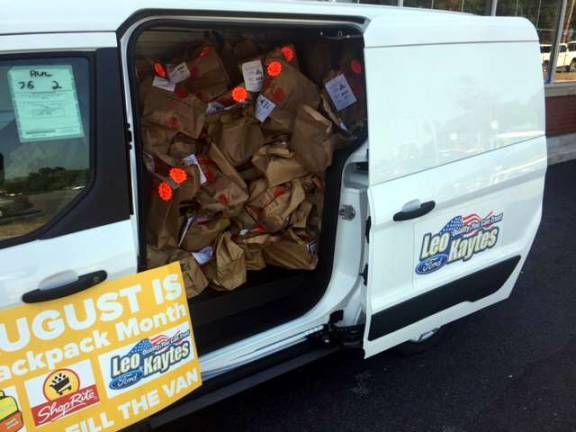 Backpack Snack Attack sixth annual Back to School Month raises $12,790 Provided photo Leo Kayte's Ford and Shop Rite partnered throughout the month in a fill a van with food campaign for the full month of August.