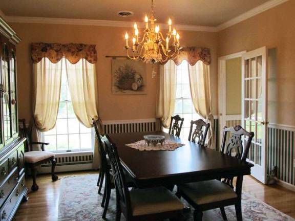 This elegant and well-appointed Colonial offers four bedrooms, scenic views and wooded privacy This elegant and well-appointed Colonial offers four bedrooms, scenic views and wooded privacy