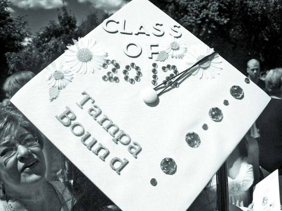S.S. Seward Institute Class of 2012 Photo by Birgit Bogler Some people wear their feelings on their sleeves, others announce their aspirations on their motar boards.