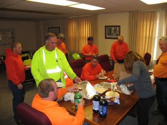 Hurrican Sandy rips through Orange County Village of Warwick DPW workers break after 17 straight hours of work. Their work was not yet over for the day.