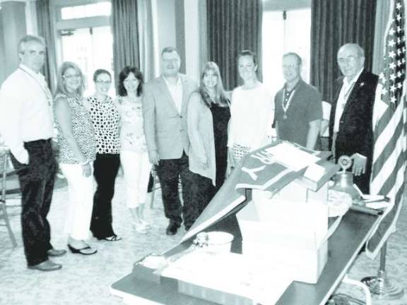 Leo Kaytes, Jr. heads Warwick Rotary Club Warwick Rotarians officers for 2014-2015 are, left to right, Leo R. Kaytes, Jr., president; Mary McClurg, treasurer; Susan Ronga, assistant treasurer; Ed Lynch, president-elect; Dr. Laurene Iammatteo, recording secretary; Katie Hansen, vice president; and Neil Sinclair, past president. Leo Kaytes, Sr., right, administered the oaths of office.
