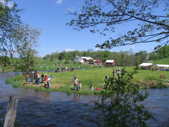 The fish were jumpin' On Saturday, May 17, over 100 youngsters along with their parents or grandparents, enjoyed comfortable temperatures, clear blue skies and a creek well stocked with trout.
