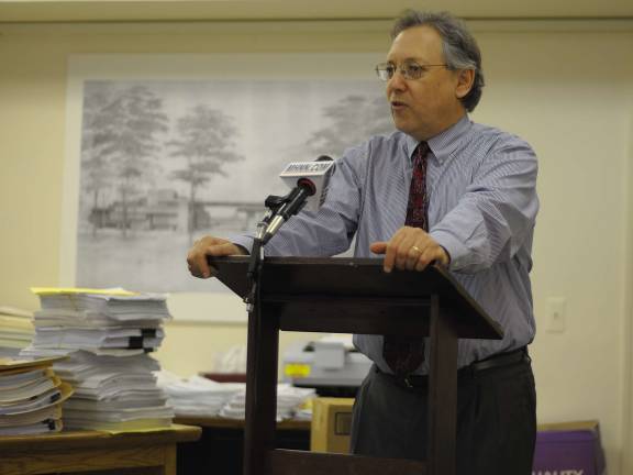 County faces suit over voting maps Photo By Joshua Rosenau Attorney Michael Sussman announces lawsuit invalidating Orange County's election maps at his Main Street offices in Goshen on May 6.