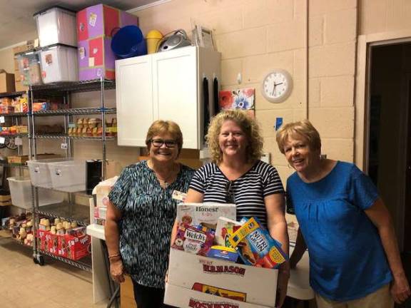 Crystal Run Healthcare employees donates to ‘Backpack Snack Attack’ Provided photo From left: Susan Cooke, Sharleen Slattery and Shirley Puett, Crystal Run Healthcare employees in Warwick, helped collect donations for "Backpack Snack Attack" to feed local children in need.